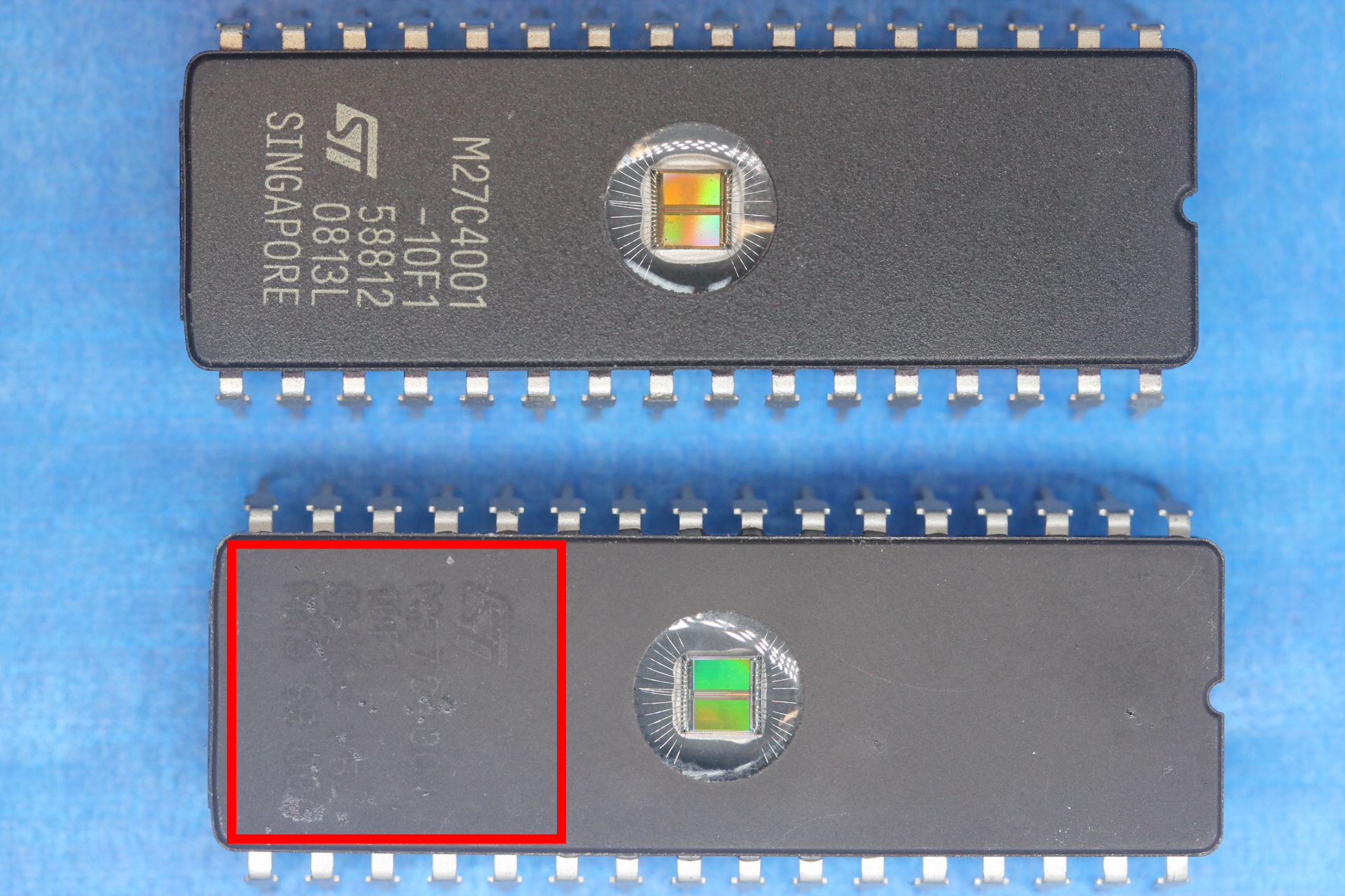 Two similar-looking microchips, one of the microchips clearly shows text that has been covered up in an attempt to hide it.